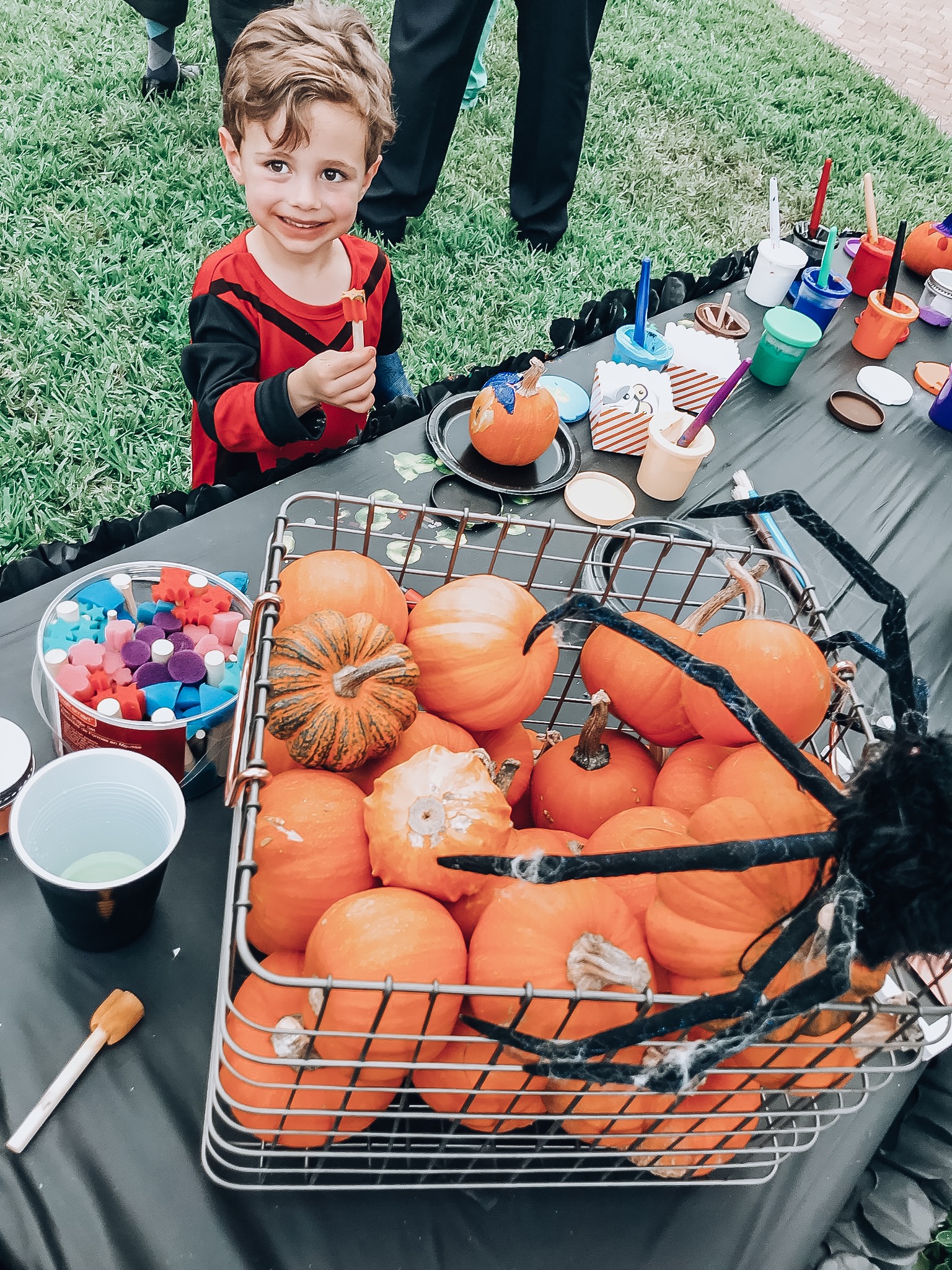 kid-friendly halloween party, pumpkin decorating, painting pumpkins