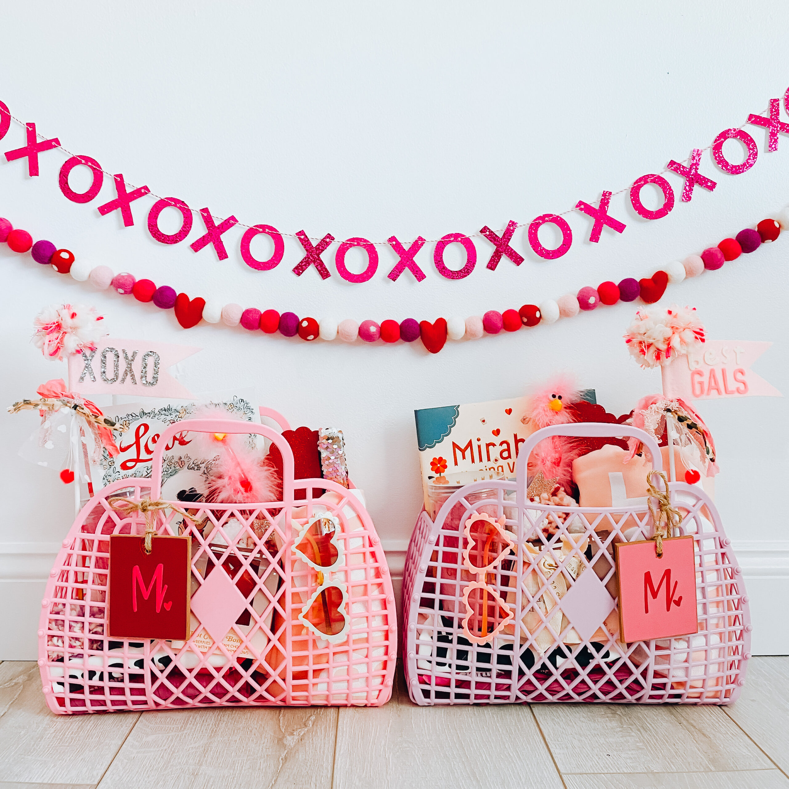 Pink and Purple jelly basket bags filled with gifts for children, Valentine's Day gift basket ideas