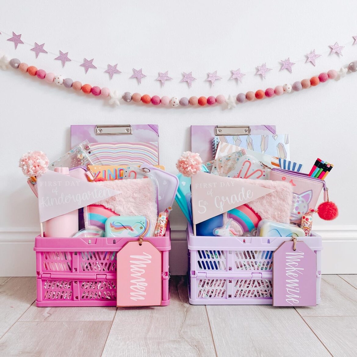 Pink and purple crates with school supplies in them