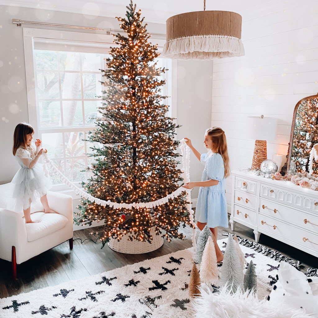 Decorating Christmas Tree, lights, ornaments, little girls